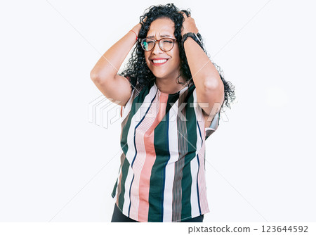 Overwhelmed young woman holding her forehead. Stressed and tired afro woman holding her head isolated Overwhelmed young woman holding her forehead. Stressed and tired afro woman holding her head isolated 123644592