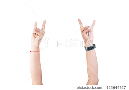 Hands making horns gesture isolated. Hands making rocknroll gesture Hands making horns gesture isolated. Hands making rocknroll gesture 123644837