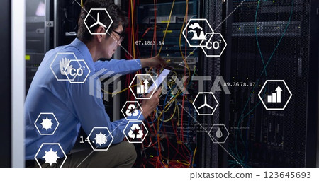 Image of eco icons and digital data processing over asian male it engineer by computer servers 123645693