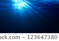Underwater lights rays light beams penetrating the surface of water 8K 123647380
