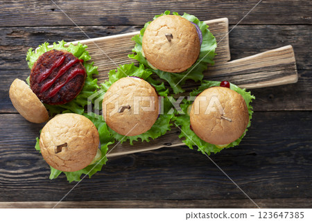 Tasty grilled home made burgers with beef Tasty grilled home made burgers with beef 123647385