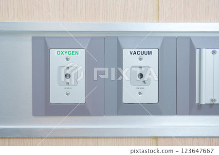 Oxygen and Vacuum Pipeline socket for Patient medical treatment in hospital room. Medical equipment, Emergency, Professional Medical system , Intensive Care Unit and Safety concept 123647667