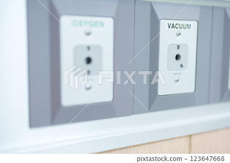 Oxygen and Vacuum Pipeline socket for Patient medical treatment in hospital room. Medical equipment, Emergency, Professional Medical system , Intensive Care Unit and Safety concept 123647668