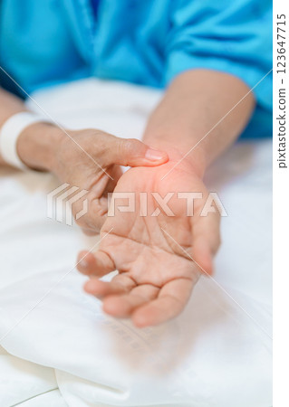 Elderly Patient Woman having wrist pain in hospital, muscle ache due to Carpal Tunnel Syndrome, De Quervain s tenosynovitis, rheumatoid, arthritis, gout, Parkinson disease and ergonomic healthcare Elderly Patient Woman having wrist pain in hospital, muscle ache due to Carpal Tunnel Syndrome, De Quervain s tenosynovitis, rheumatoid, arthritis, gout, Parkinson disease and ergonomic healthcare 123647715