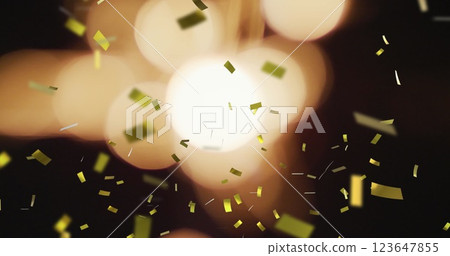 Image of confetti falling on black background Image of confetti falling on black background 123647855
