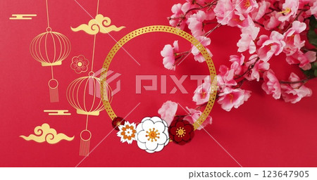 Image of chinese traditional decorations and blossom on red background 123647905