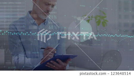 Image of financial data processing over caucasian male doctor taking notes 123648514