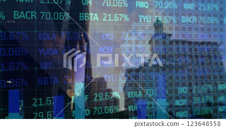 Image of stock market and diagrams over cityscape 123648558