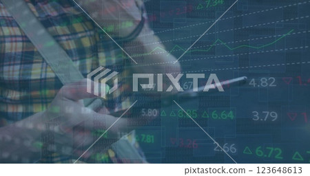 Image of financial data processing over caucasian man using tablet 123648613