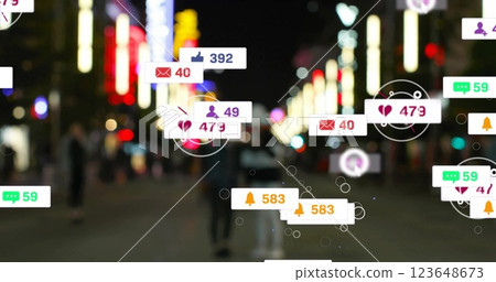 Image of social media icons with growing numbers over people walking on city street Image of social media icons with growing numbers over people walking on city street 123648673