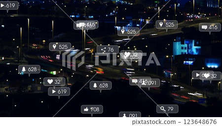 Image of social media icons with growing numbers over cars on street 123648676