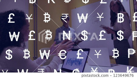 Image of currency symbols and data processing over diverse business people in office Image of currency symbols and data processing over diverse business people in office 123649676