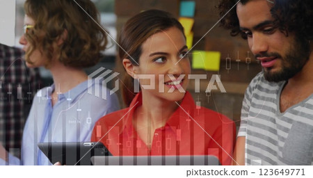 Image of data processing and diagrams over diverse colleagues using tablet Image of data processing and diagrams over diverse colleagues using tablet 123649771