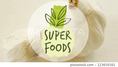 Image of super foods text over garlic on white background Image of super foods text over garlic on white background 123650162