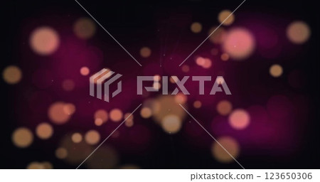 Image of glowing light spots over black background 123650306