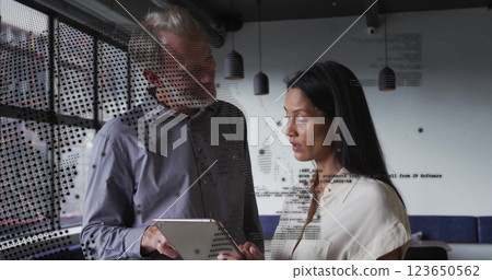 Image of world map and data processing over diverse business people in office 123650562