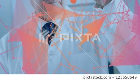 Image of network of connections over caucasian male scientist in laboratory 123650649