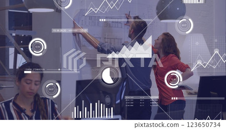 Image of financial data processing over diverse business people in office Image of financial data processing over diverse business people in office 123650734