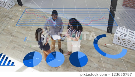 Image of financial data processing over diverse businesspeople in office Image of financial data processing over diverse businesspeople in office 123650797