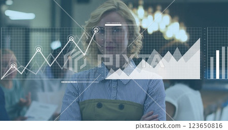 Image of financial data processing over caucasian businesswoman in office 123650816