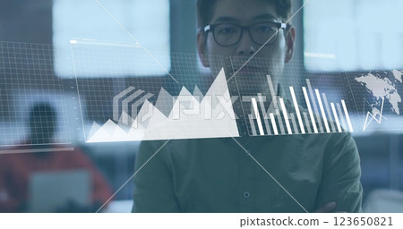 Image of financial data processing over asian businessman in office Image of financial data processing over asian businessman in office 123650821