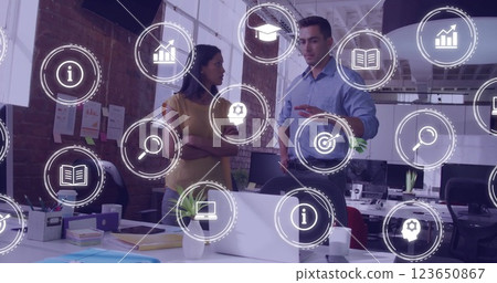 Image of digital business icons over diverse business people in office 123650867