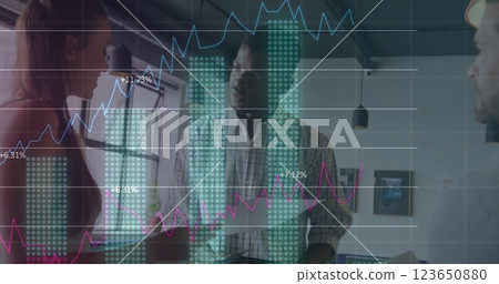 Image of data processing and diagrams over diverse colleagues discussing work in office 123650880