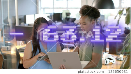 Image of financial data processing over diverse businesswomen in office 123650981