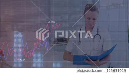 Image of financial data processing over caucasian female doctor 123651019