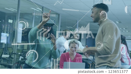 Image of financial data processing over diverse business people in office 123651377