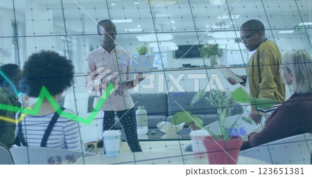 Image of financial data processing over diverse business people in office Image of financial data processing over diverse business people in office 123651381