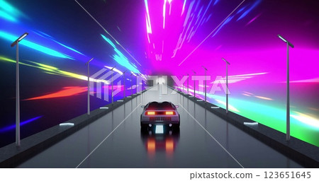 Image of car driving through tunnel with coloured light trails moving through it 123651645