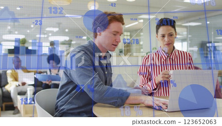 Image of data processing and diagrams over caucasian colleagues discussing work in office 123652063