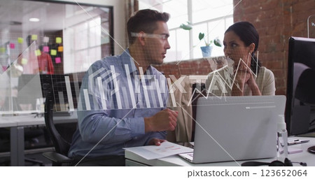 Image of data processing and diagrams over diverse colleagues discussing work in office Image of data processing and diagrams over diverse colleagues discussing work in office 123652064
