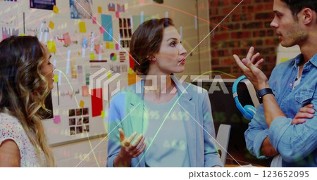 Image of financial data processing over diverse business people in office 123652095