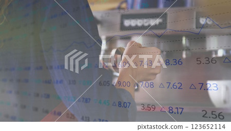 Image of financial data processing over caucasian female barista making coffee Image of financial data processing over caucasian female barista making coffee 123652114
