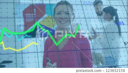 Image of financial data processing over diverse business people in office 123652158