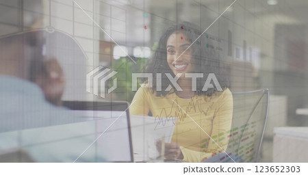 Image of financial data processing over diverse business people in office 123652303