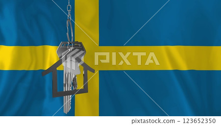 Image of silver house key over flag of sweden 123652350