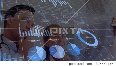 Image of data processing and diagrams over caucasian doctors checking xray Image of data processing and diagrams over caucasian doctors checking xray 123652436