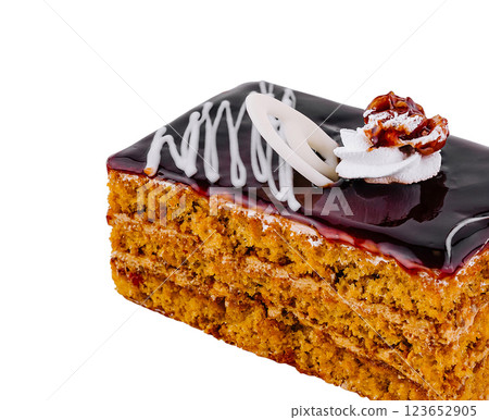 Delicious chocolate cake piece decorated with cream and walnut 123652905
