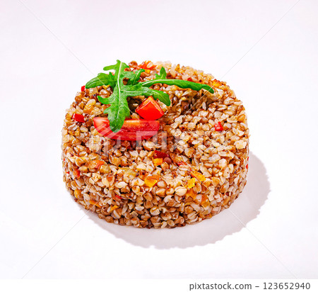 Healthy buckwheat dish with fresh vegetables and herbs Healthy buckwheat dish with fresh vegetables and herbs 123652940