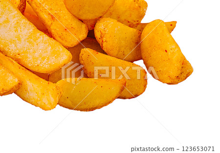 Crispy golden potato wedges on a white background 123653071