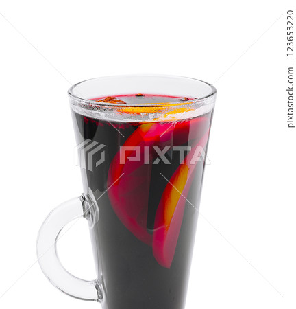 Warm beverage with citrus and fruit slices in a glass cup Warm beverage with citrus and fruit slices in a glass cup 123653220