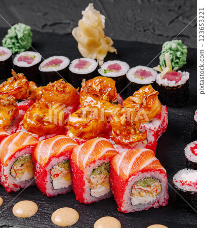 Vibrant sushi platter with shrimp and assorted rolls 123653221