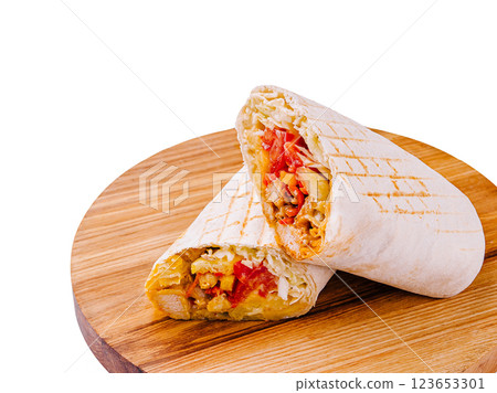 Delicious grilled wraps filled with fresh vegetables and meat Delicious grilled wraps filled with fresh vegetables and meat 123653301