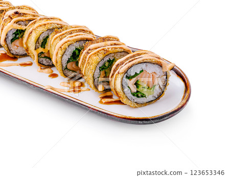 Unique fried sushi rolls presented on a decorative plate 123653346