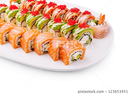 Sushi platter showcasing a variety of fresh rolls and toppings 123653451