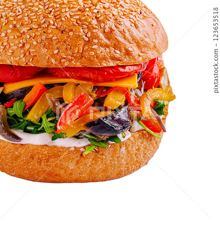 A fresh vegetable burger loaded with vibrant toppings A fresh vegetable burger loaded with vibrant toppings 123653518