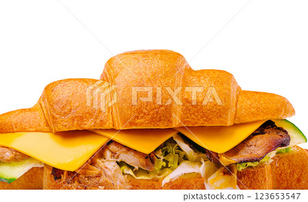 Delicious croissant sandwich filled with cheese and grilled chicken Delicious croissant sandwich filled with cheese and grilled chicken 123653547